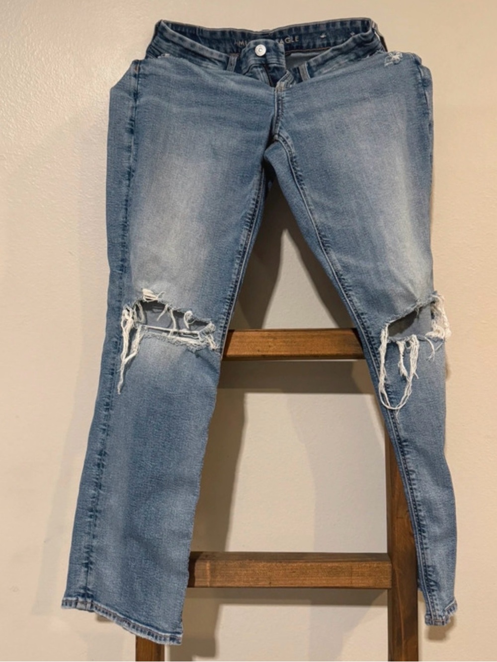 American Eagle shredded knee cutouts jeans